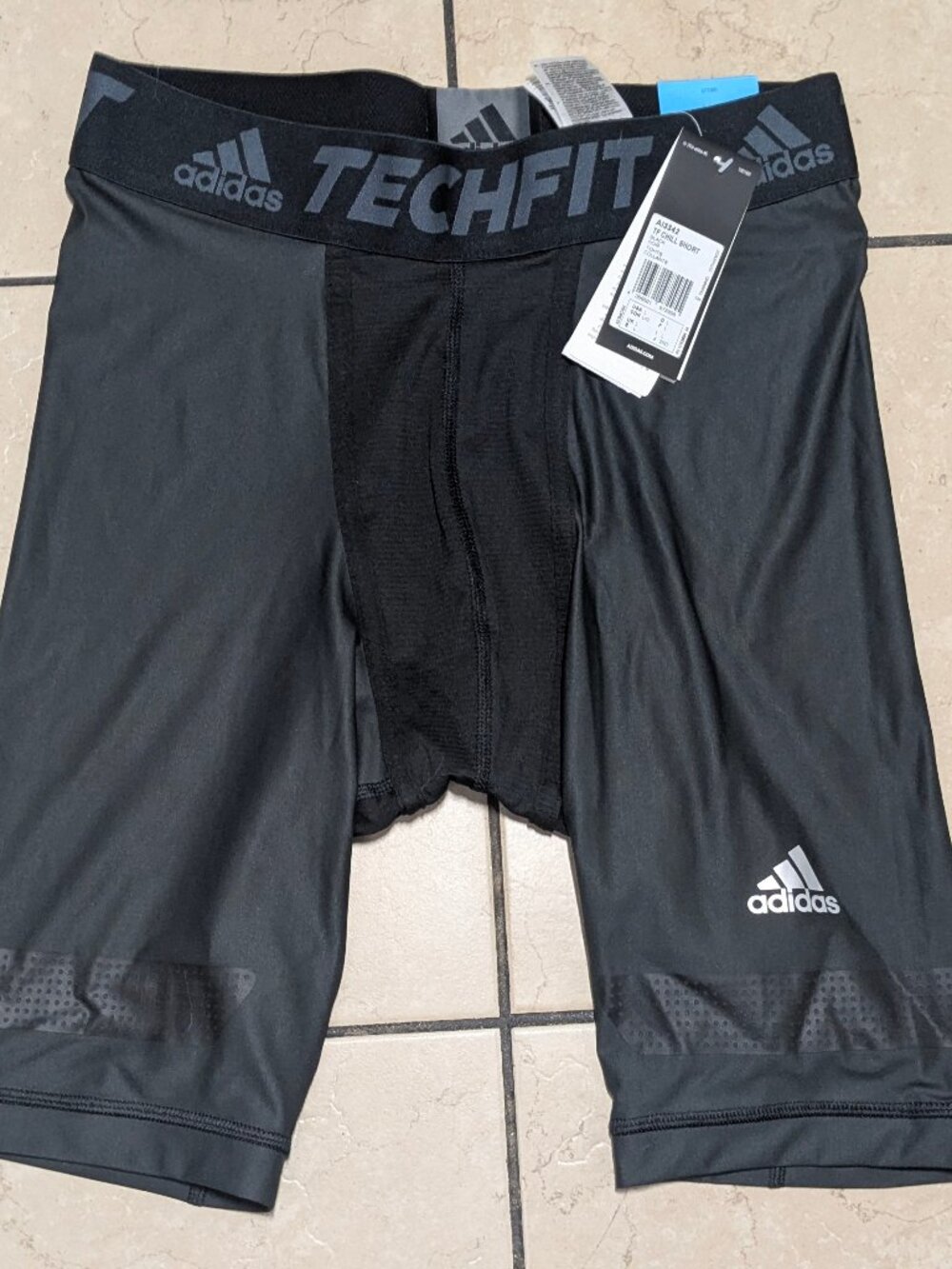 NWT Adidas Techfit Climachill Shorts in black, available in men's large size.